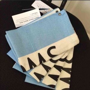 (4) TOMS shoe bags.